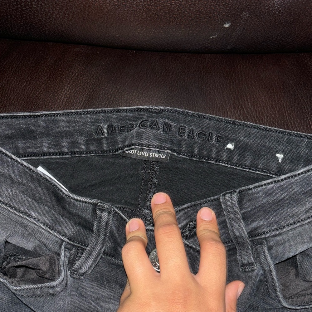 American Eagle skinny ripped jeans.